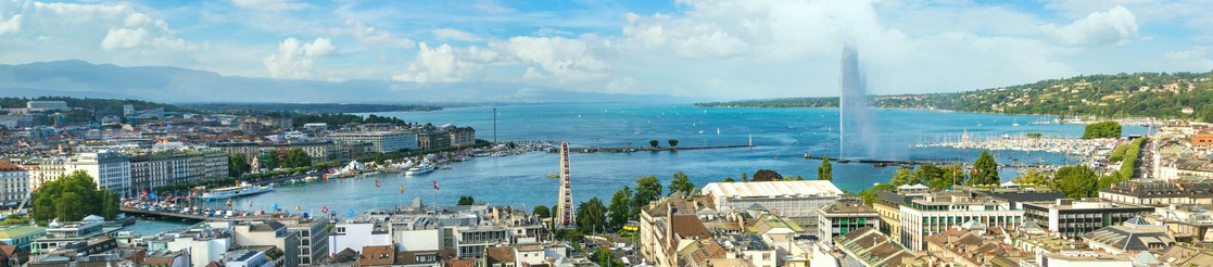 Panoramic view of Geneva and the jet d'eau on a sunny day